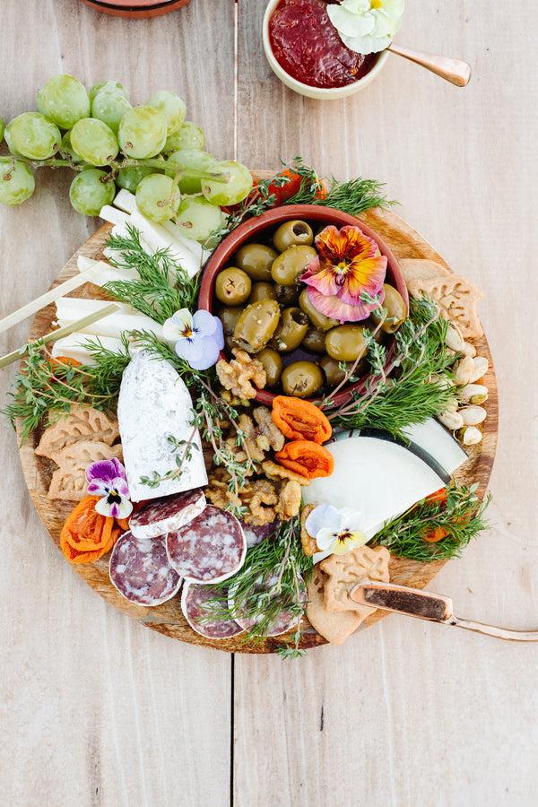 Santa Barbara Organic Pistachios on a cheese plate at a Santa Barbara Picnic | Slate Catering | Danielle Motif Photography